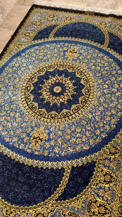 Blue and gold medallion carpet